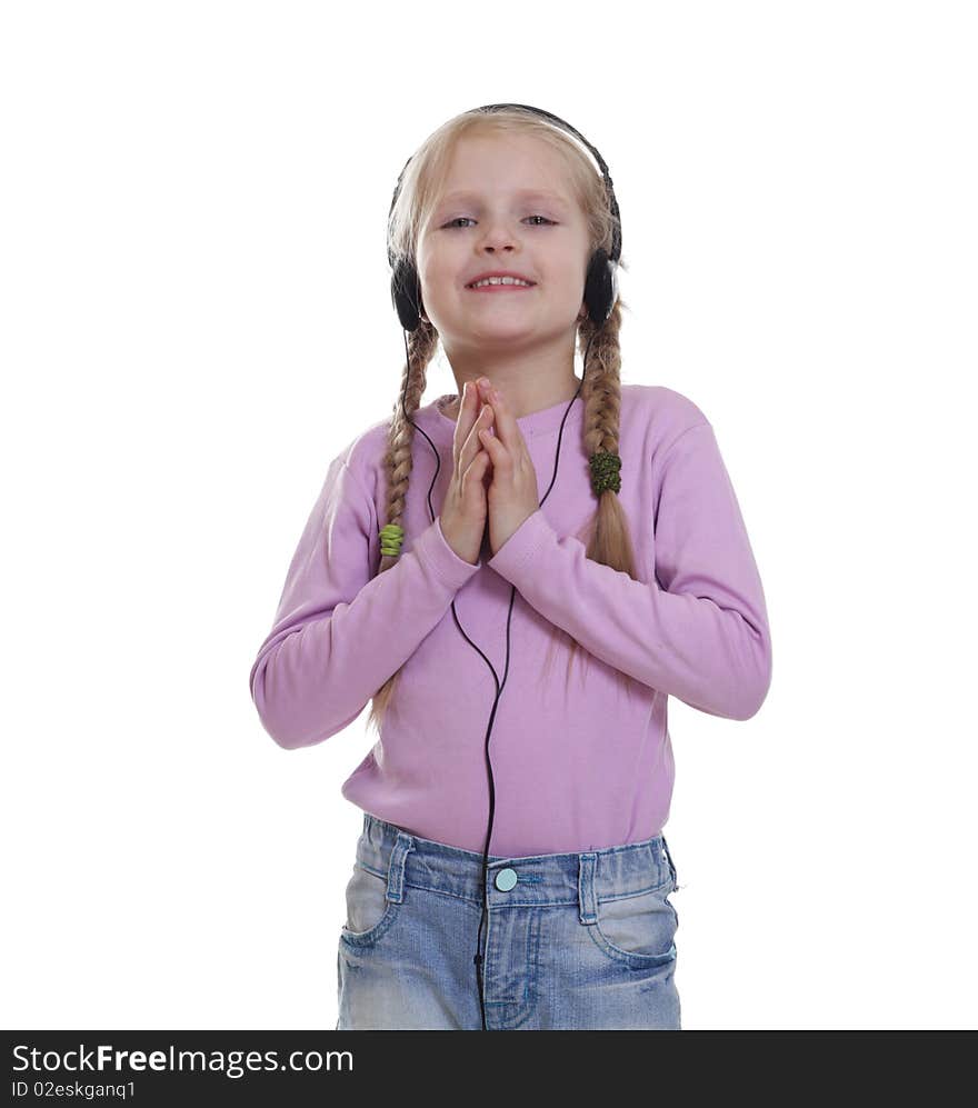 The smile little girl in headphones. Isolated on a white background