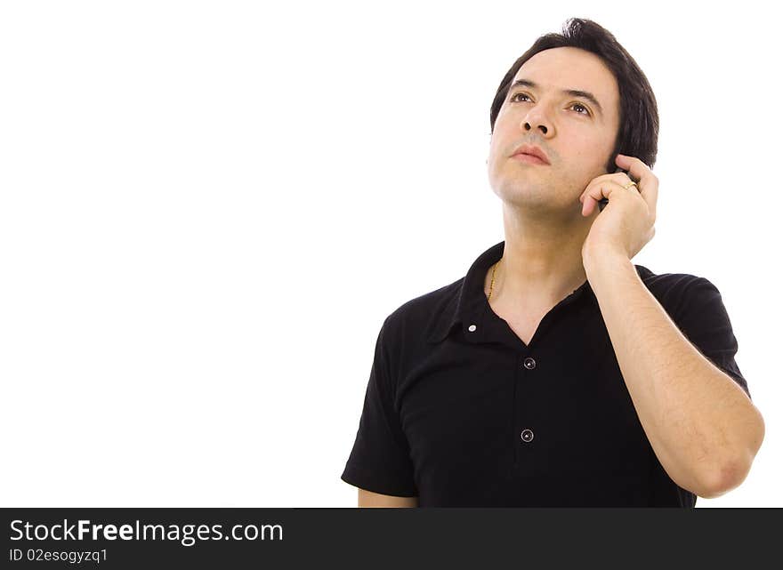 Young casual man using cellphone isolated on whithe. Young casual man using cellphone isolated on whithe