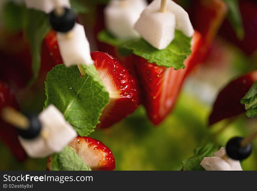 Fresh strawberries with peppermint and mozzarella cheese. Fresh strawberries with peppermint and mozzarella cheese