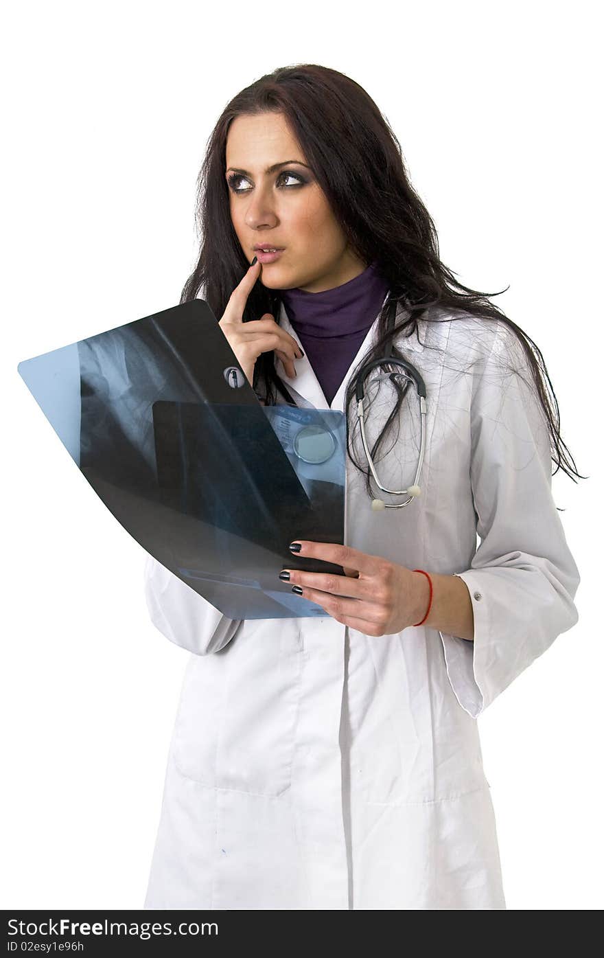 Cute female doctor holding xray scans. Cute female doctor holding xray scans