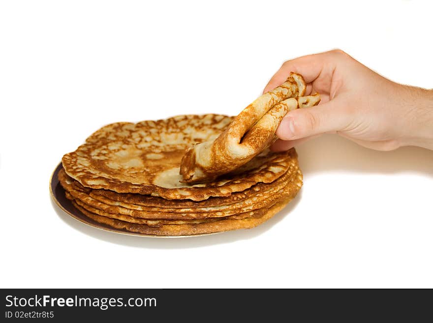 The Plate Of Russian Pancakes And Man S Hand