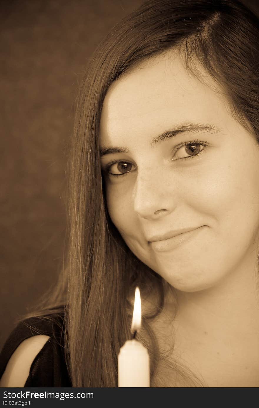 Portrait of Young Woman Smiling with Candle for religious and people presentations. Portrait of Young Woman Smiling with Candle for religious and people presentations