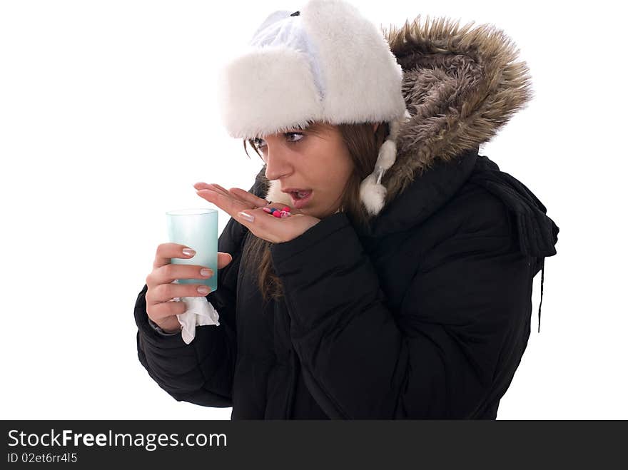 Young woman holding pills for protection her health