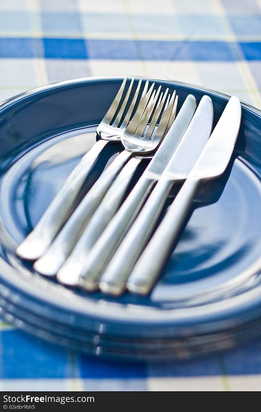 Stack of blue dishware and tableware