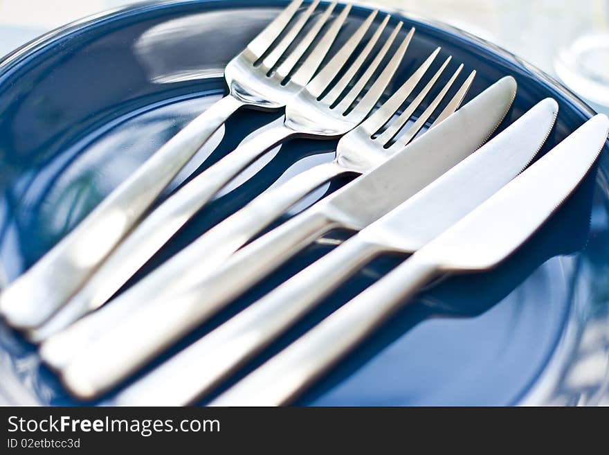 Stack of blue dishware and tableware