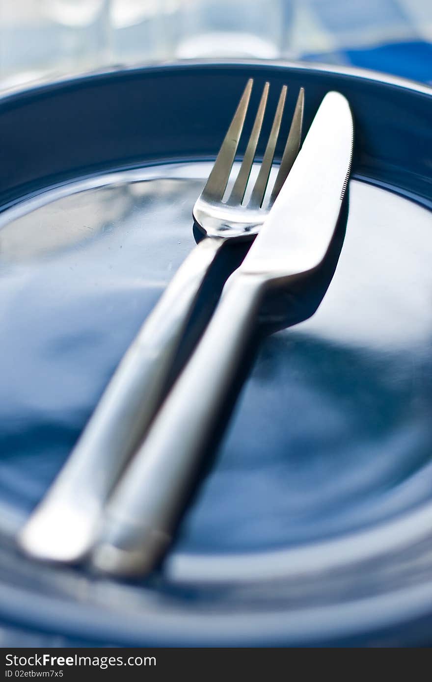 Stack of blue dishware and tableware