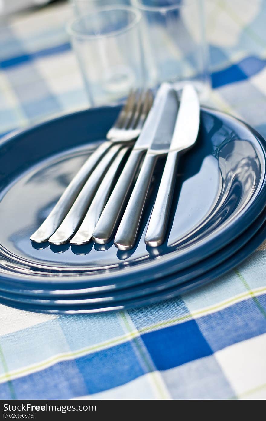 Stack of blue dishware and tableware