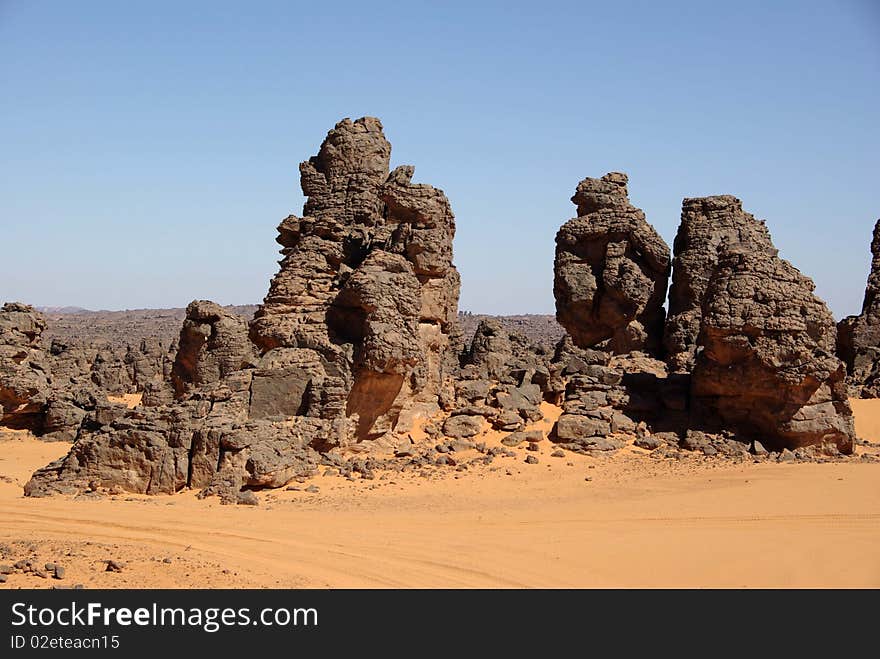 Sandstone peaks in the desert of Libya, in Africa. Sandstone peaks in the desert of Libya, in Africa