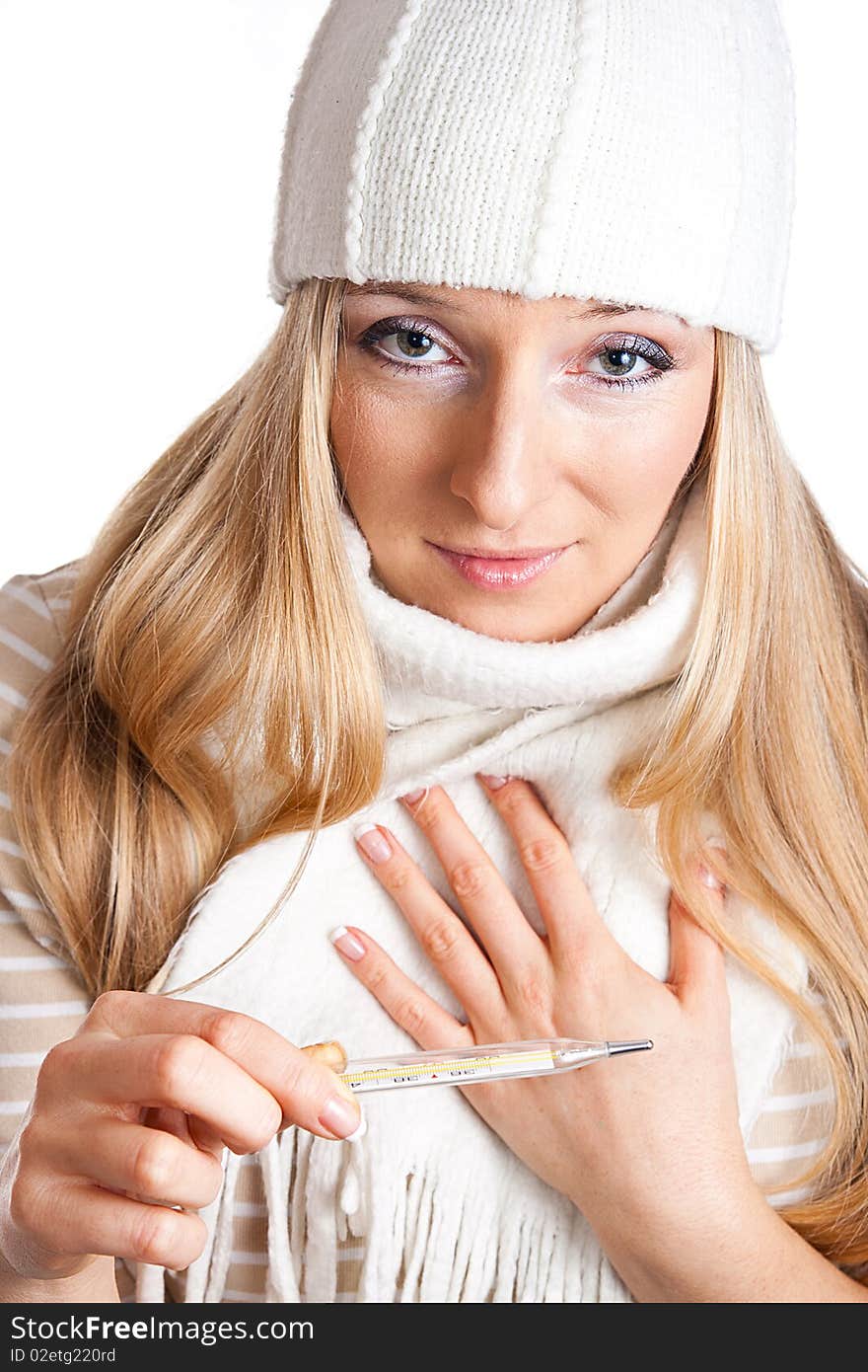 Woman holding thermometer, with hand on her head, worried and sick. Woman holding thermometer, with hand on her head, worried and sick