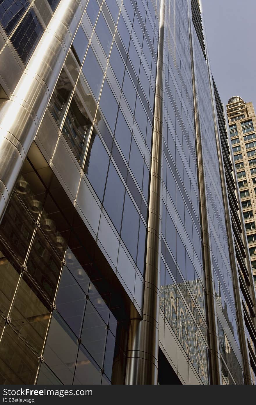 Modern corporate building with another skyscraper in background. Modern corporate building with another skyscraper in background