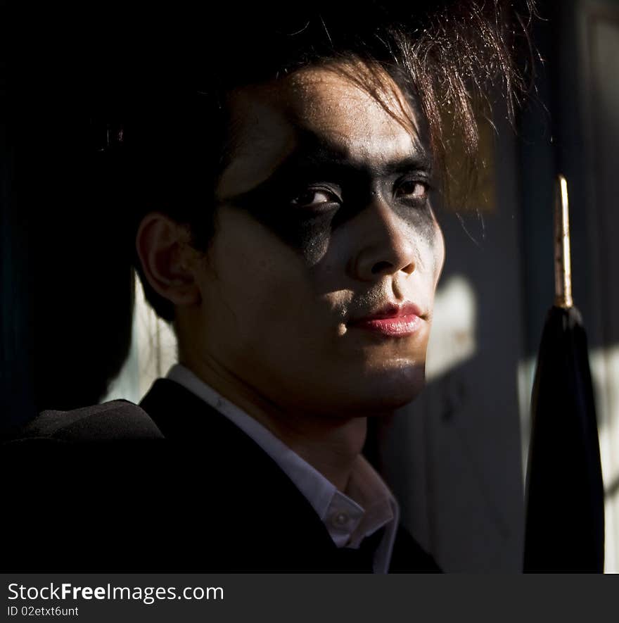 Male model in dark make up