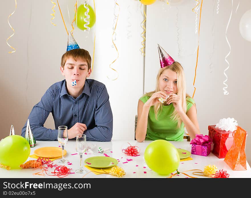 Young happy smiling couples at birthday. Young happy smiling couples at birthday