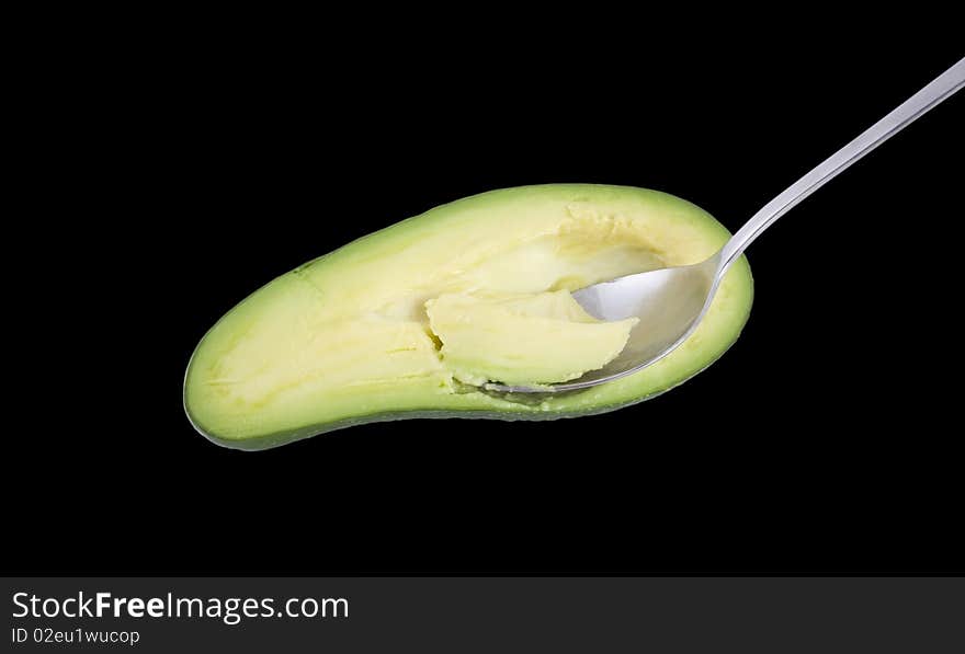 Spoon In The Avocado.