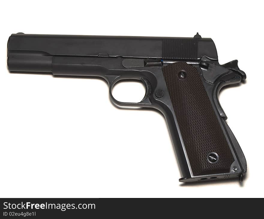 45 caliber pistol isolated over white