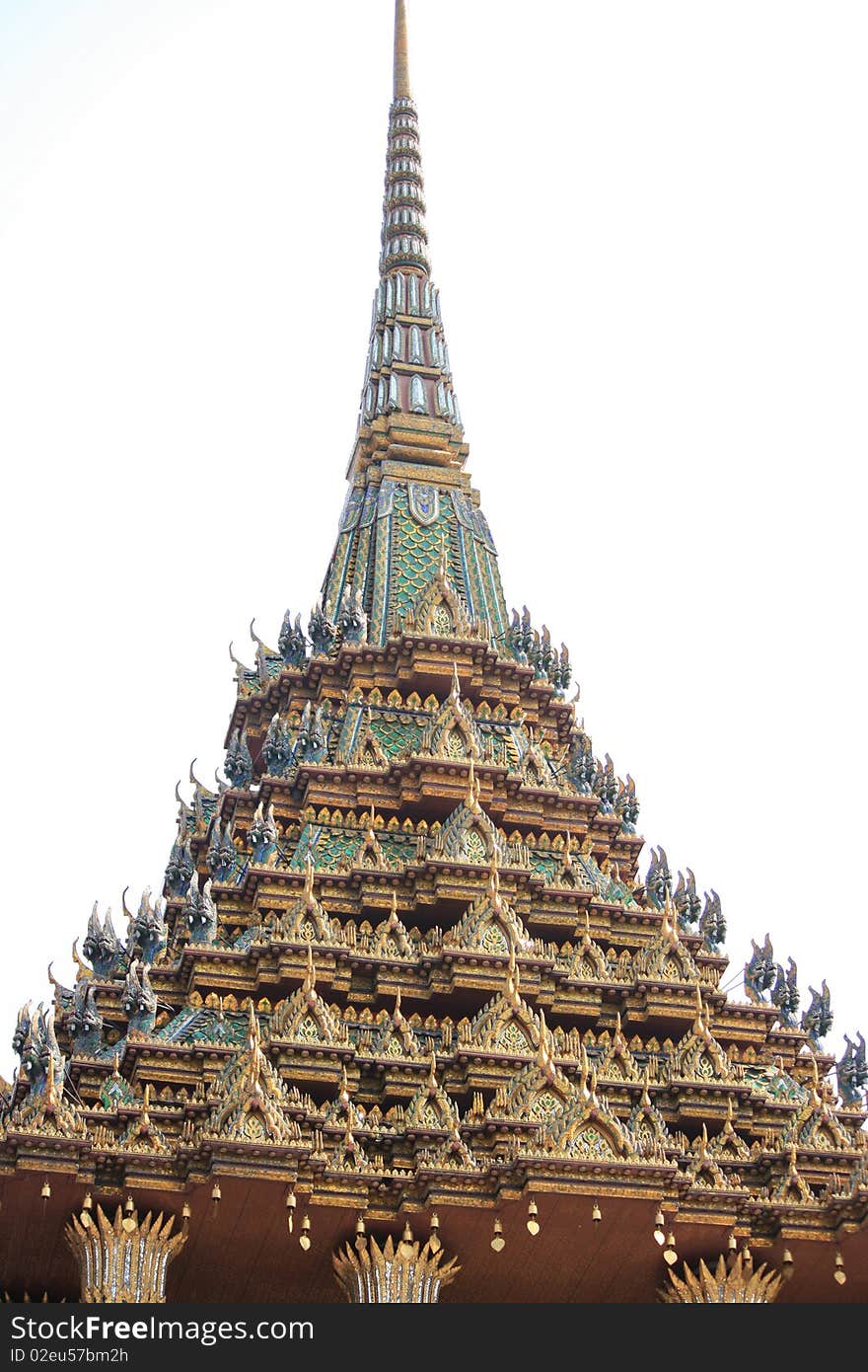 Details of traditional Thai art on base of church.