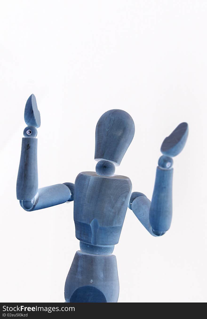 A blue wooden manikin on white background