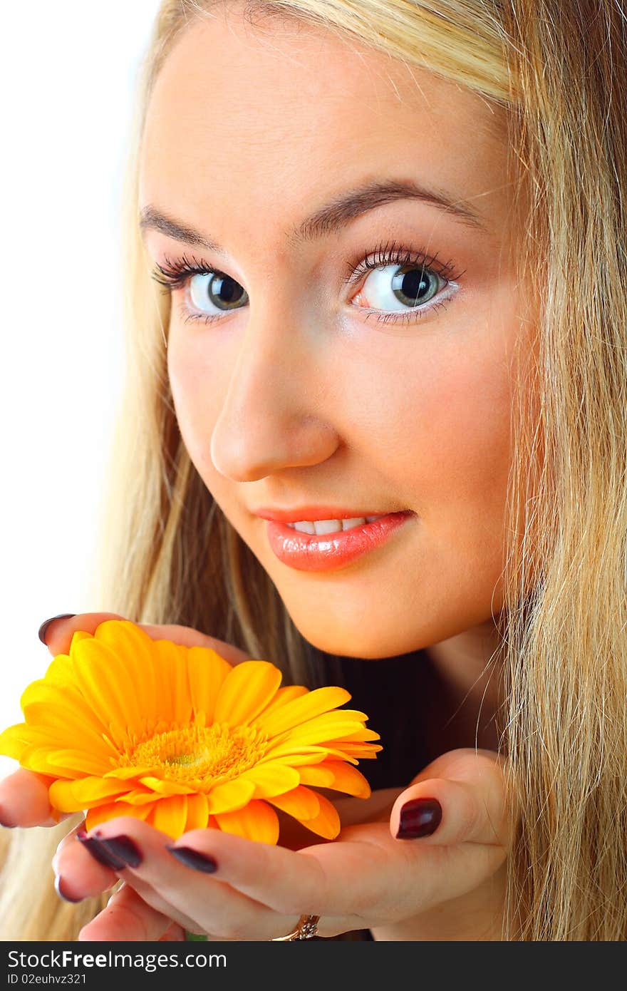 Young woman with a flower. Over white background