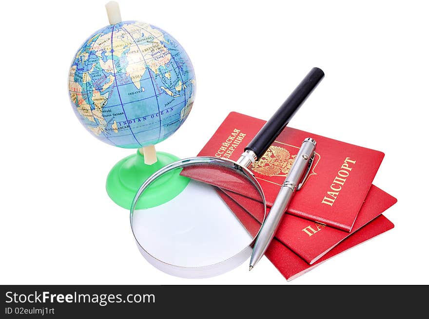 Three passports,  globe and magnifier on white background. Three passports,  globe and magnifier on white background