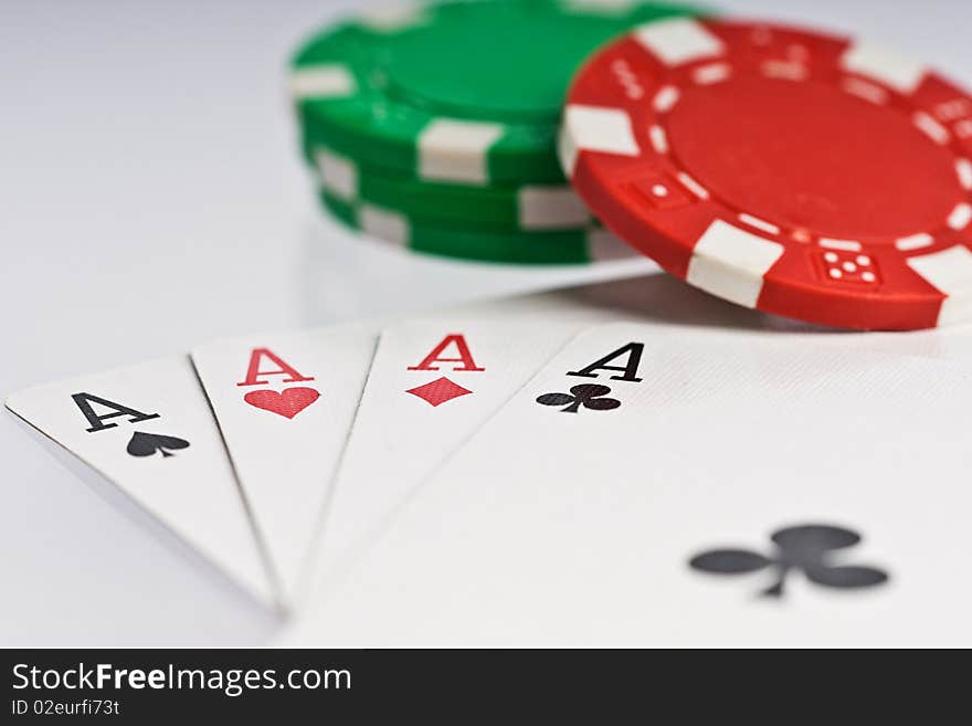 Poker cards, four aces with green and red chips. Poker cards, four aces with green and red chips