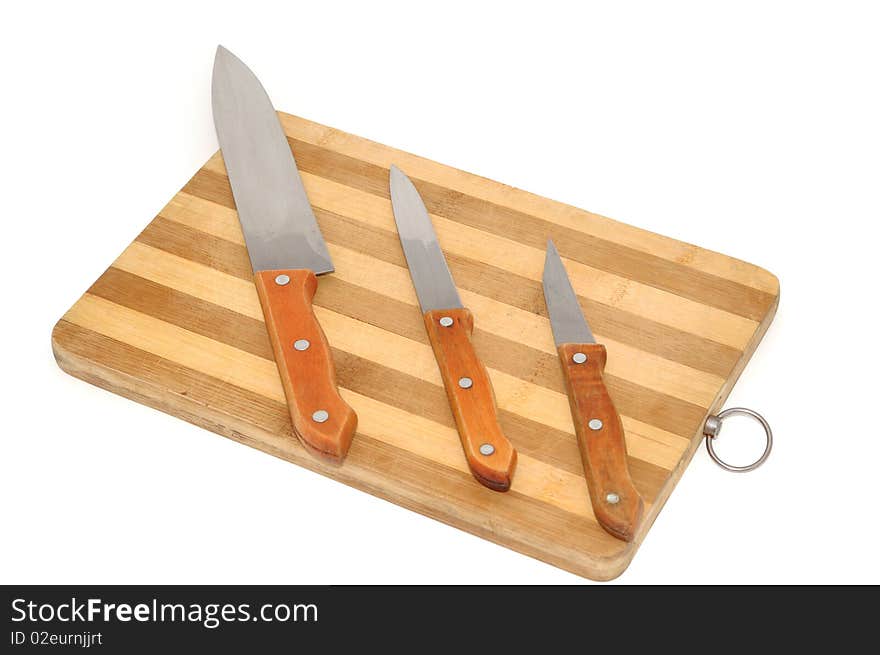 Kitchen knifes on board