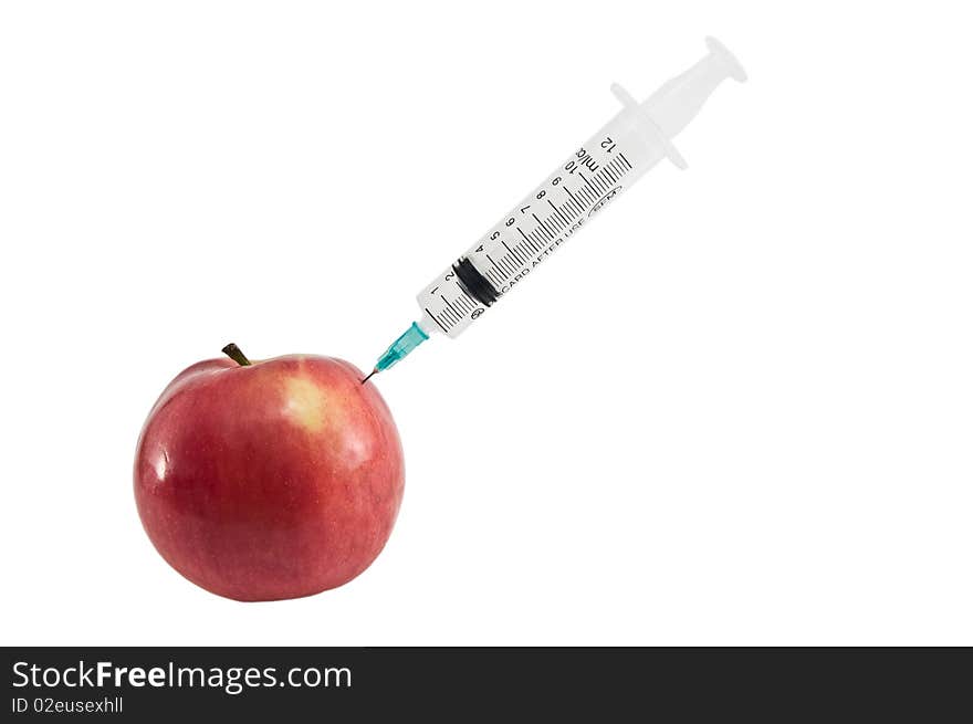 Apple and syringe.