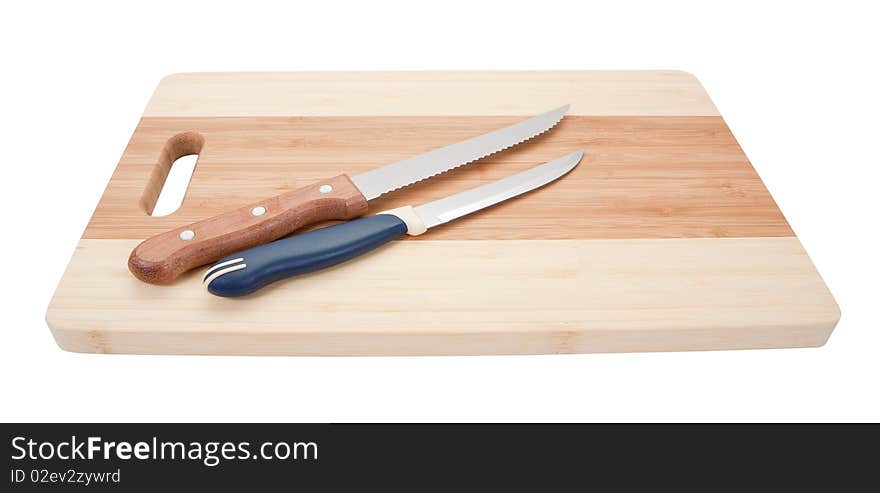 Two knifes with wooden handle over cutting board, isolated on white background. Two knifes with wooden handle over cutting board, isolated on white background