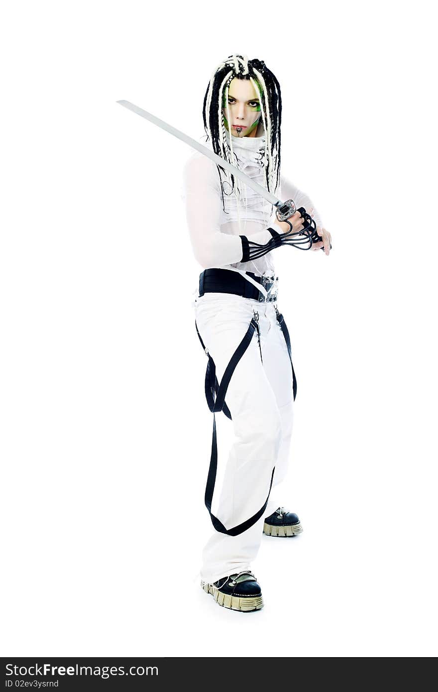 Shot of a stylish male warrior standing with his sword. Isolated over white background. Shot of a stylish male warrior standing with his sword. Isolated over white background.