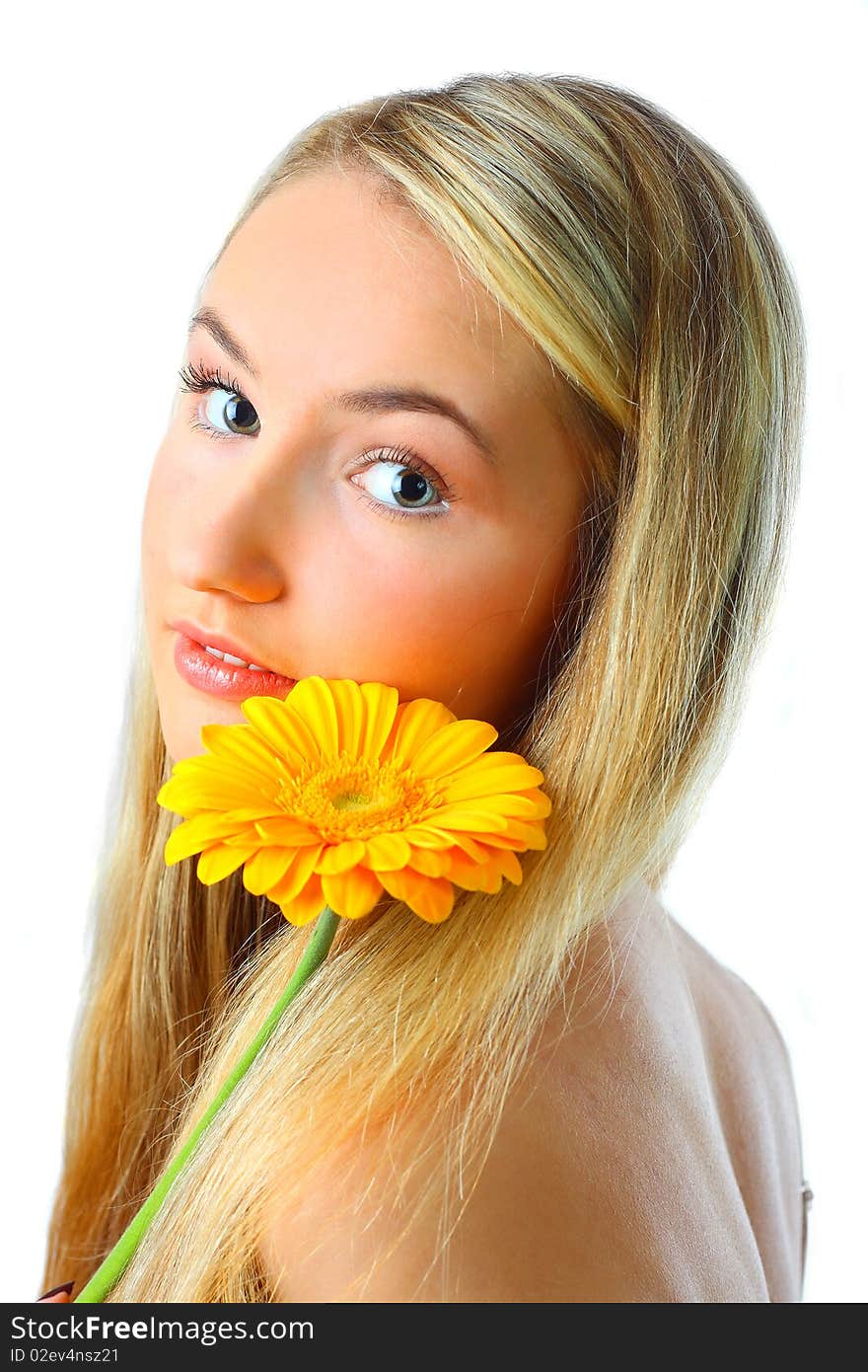 Young woman with a flower. Over white background