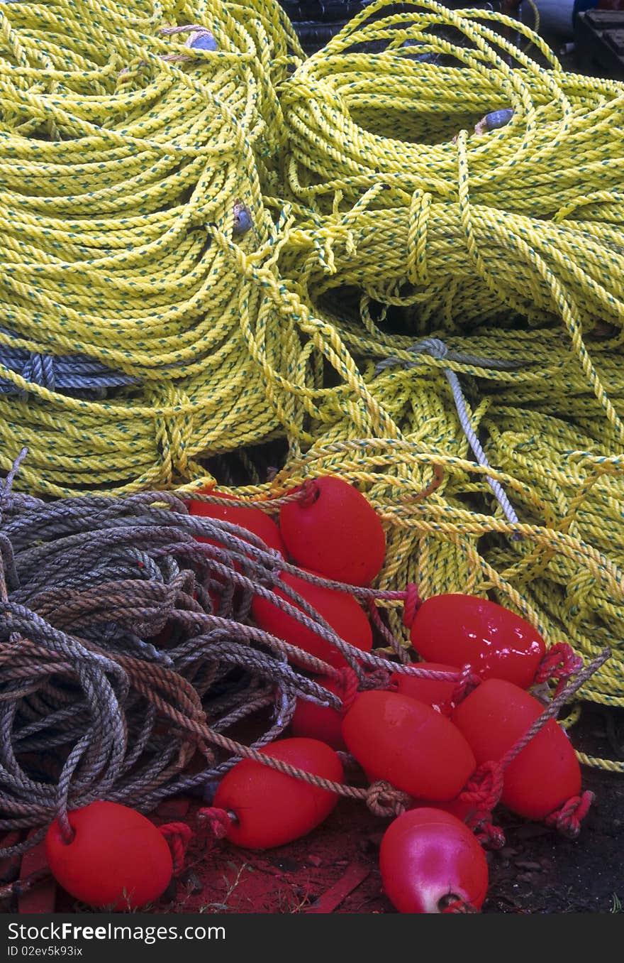 Colorful rope and crab trap buoys on a wharf