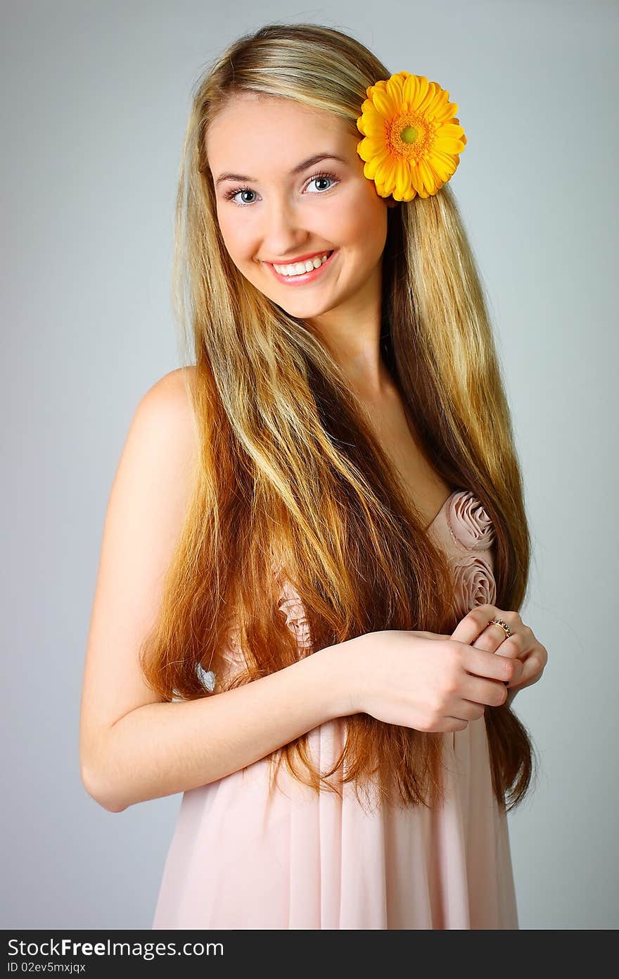 Beautiful young girl posing in studio