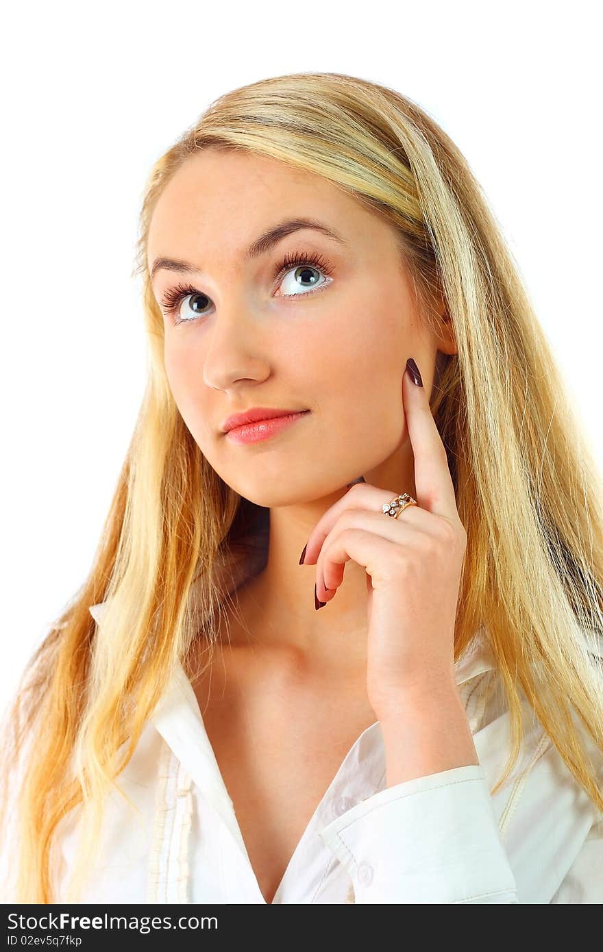 Beautiful young woman thinking on a white background