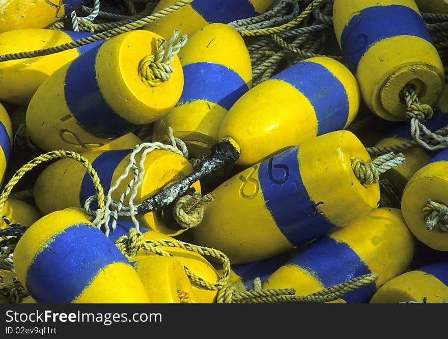 Colorful rope and crab trap buoys on a wharf