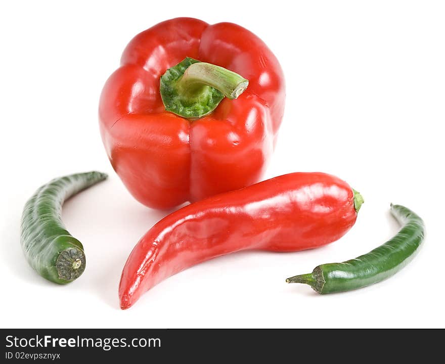 This sweet and bitter pepper on a white background. This sweet and bitter pepper on a white background