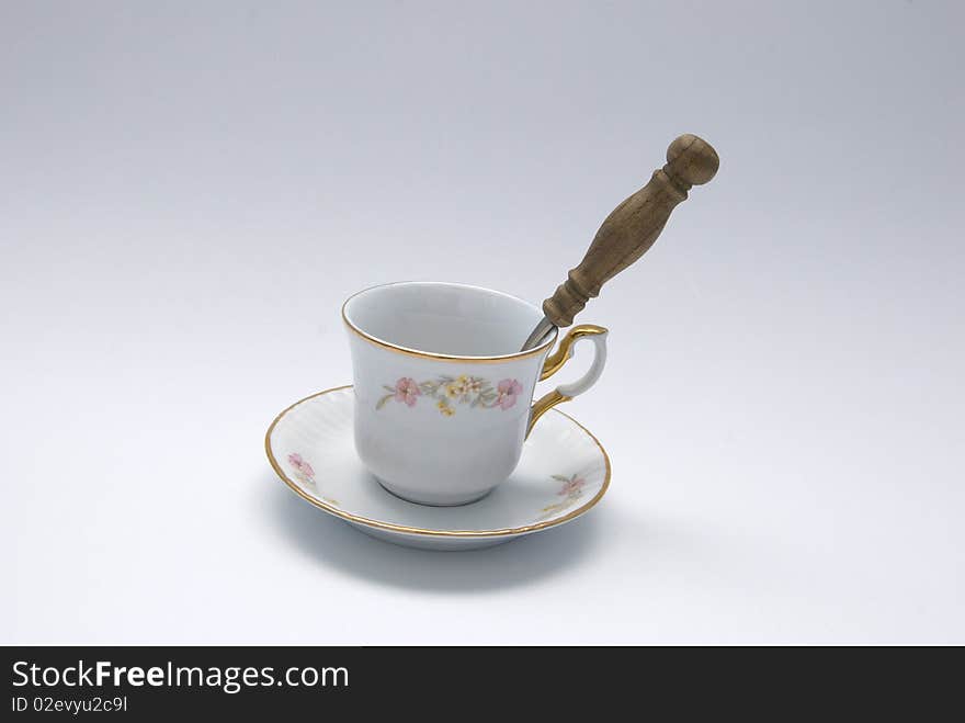 Cup and spoon