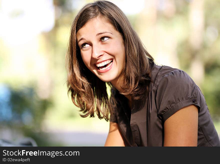 Closeup portrait of a happy young woman smiling