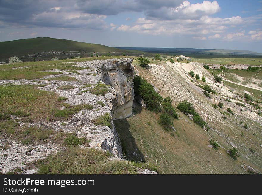 Crimea chalky mountains under cloudy sky