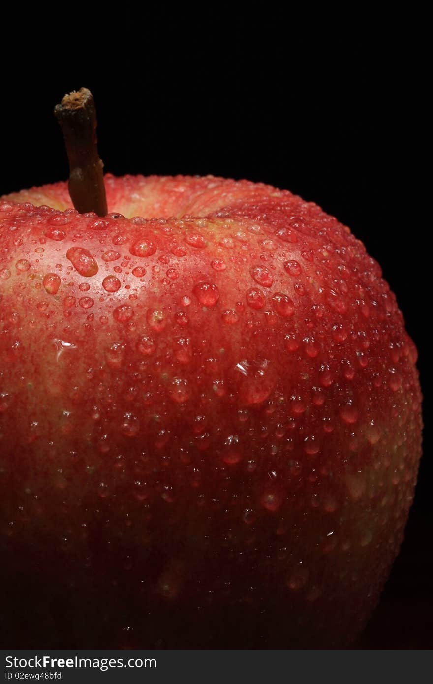 Artistic photo of a freshly washed gala apple. Artistic photo of a freshly washed gala apple.