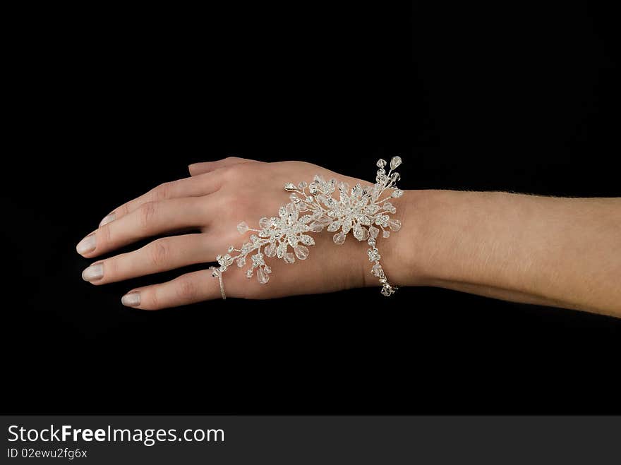 Elegant bracelet on a hand of the girl