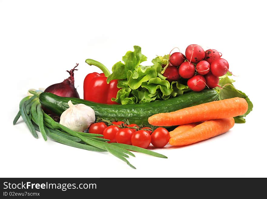 Fresh vegetables. Included are  tomatoes, carrots, cucumber, onions