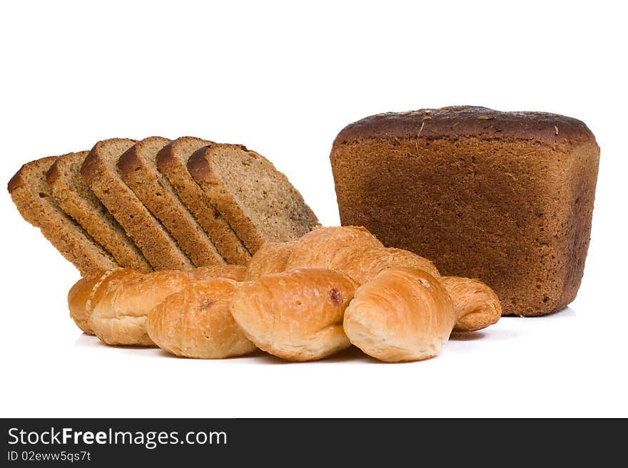 Bread and croissant on white