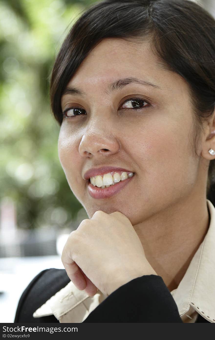 Portrait shot of an Asian businesswoman smiling