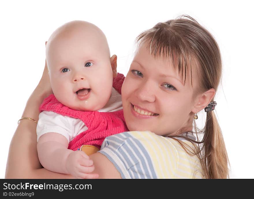 Happy mother with baby over white background. Cute little baby embrace her mother