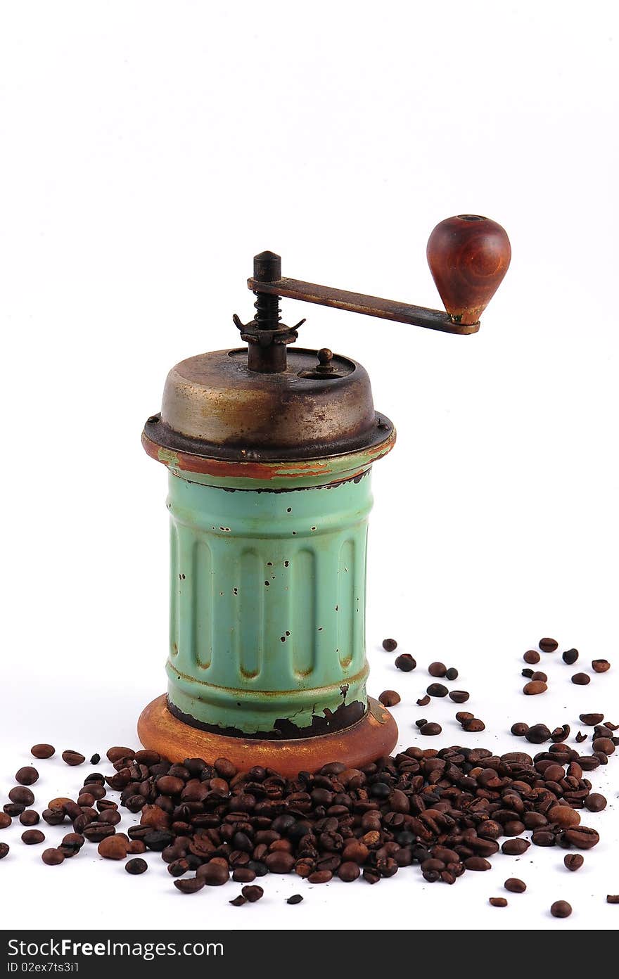 Vintage coffee grinder and coffee beans