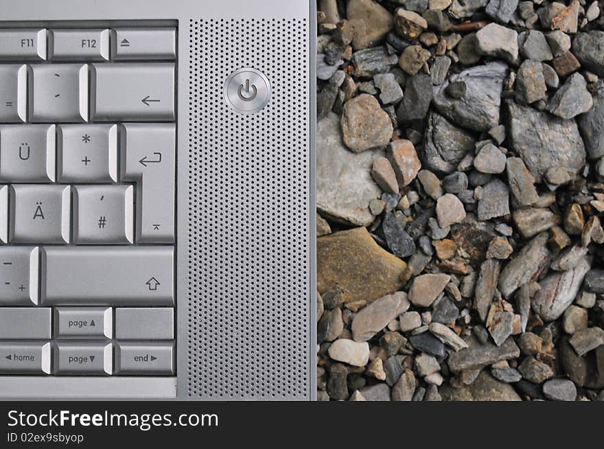 Laptop on the rocks of the same color. Laptop on the rocks of the same color