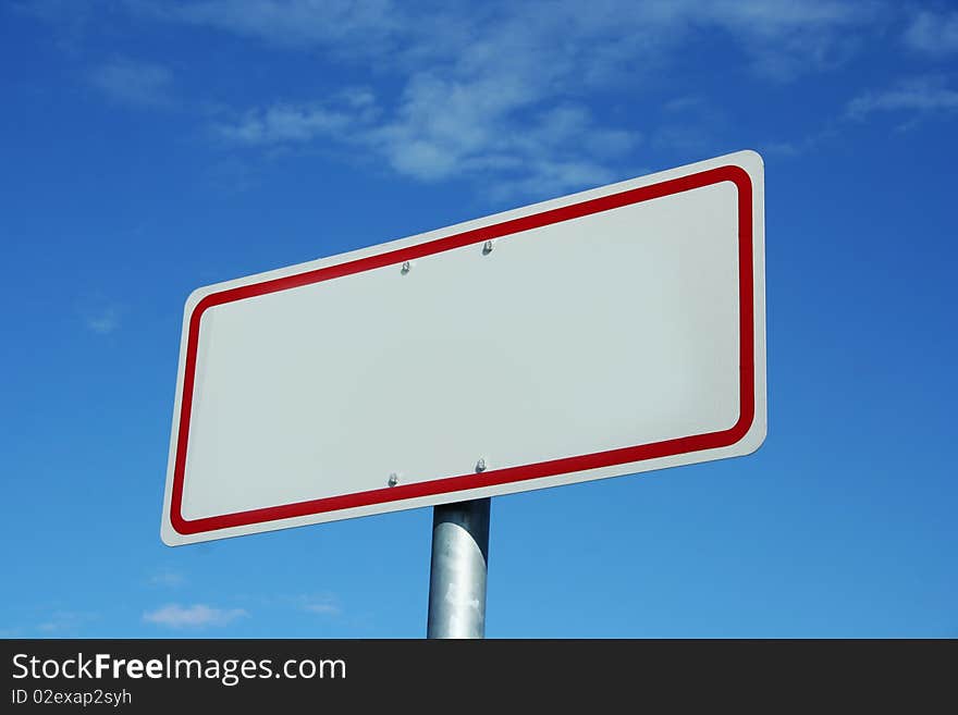 Blank sign and sky with clouds