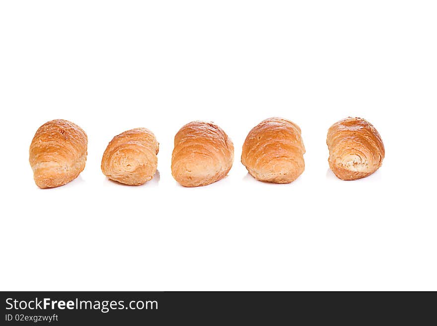 Five isolated croissants