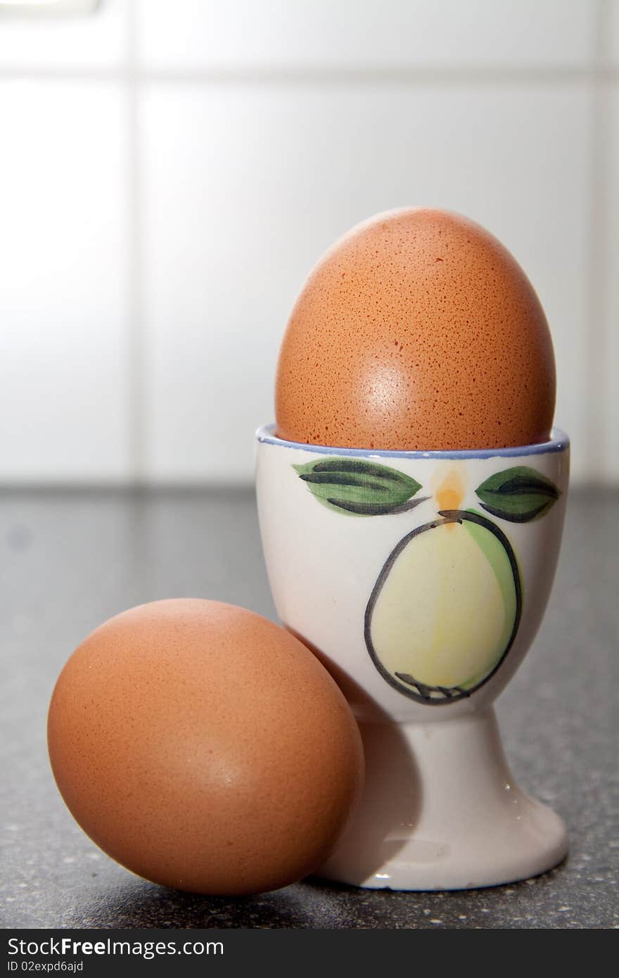 Fresh brown eggs standing in the kitchen