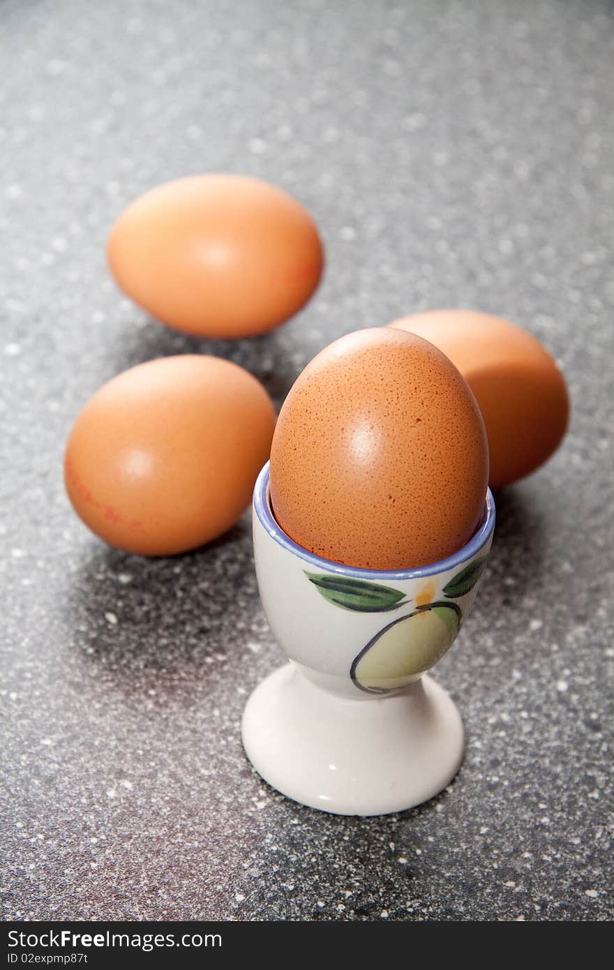 Fresh brown eggs standing in the kitchen