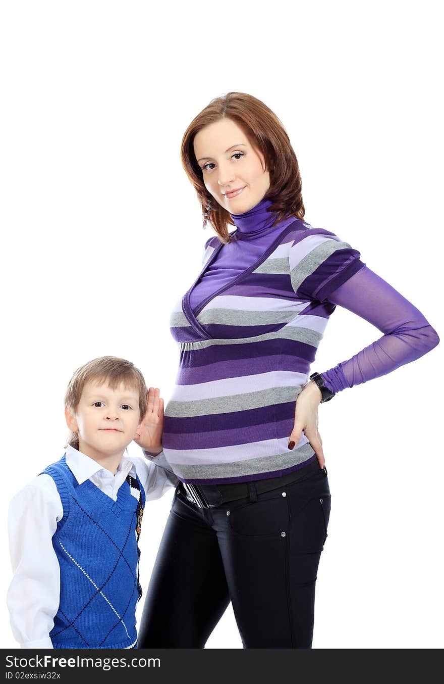 Happy pregnant woman with her son. Isolated over white background. Happy pregnant woman with her son. Isolated over white background.