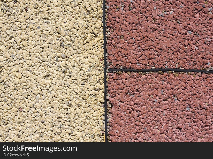 A pattern created by the colored asphalt. A pattern created by the colored asphalt